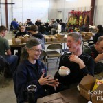 Annie Pillers and Chris Scharer talking over lunch at the debriefing.