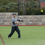 A member from the Construction Management team fires a ball to first.
