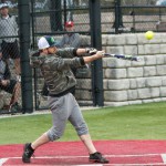 Dusty hitting the ball.