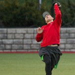 Brant catching a ball after running too hard to get to it.