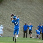 #11 Isaiah Strong catching pass during pre-game warmups