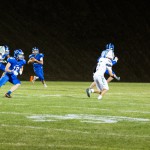 #12 Konner Kinkade rolls out for a pass
