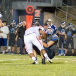 #35 Ty Handrickson making a tackle.