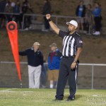 Referee Frank Slusser.