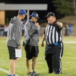 PHS coaches talking to a referee.