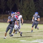 #11 Isaiah Strong running the ball.