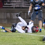 Moscow's running back gets tackled.