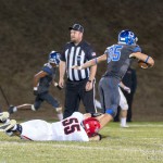 #35 Ty Hendrickson escapes an attempted tackle.