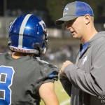 Coach Langerveld talks to #8 Carson Coulter.